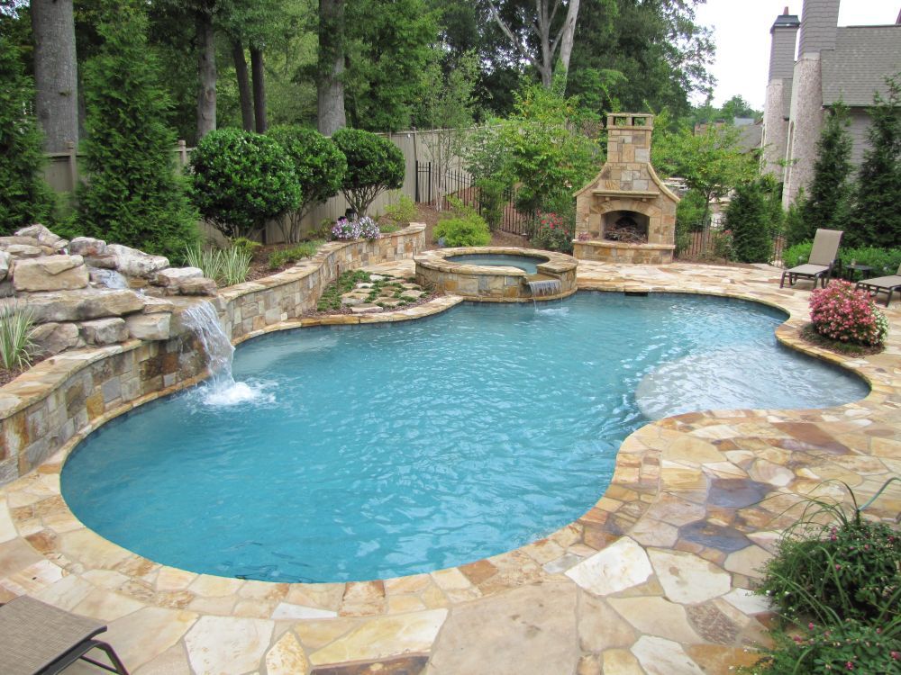 Inground Swimming Pool and Spa with waterfall and fireplace
