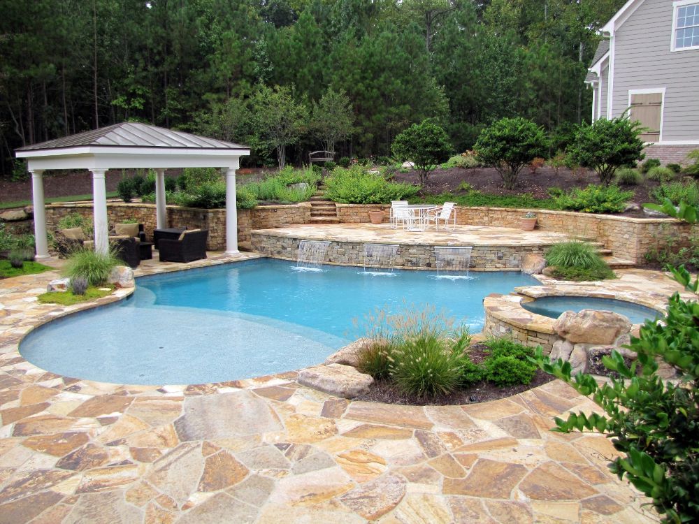 Inground Swimming Pool with sunshelf and pavilion