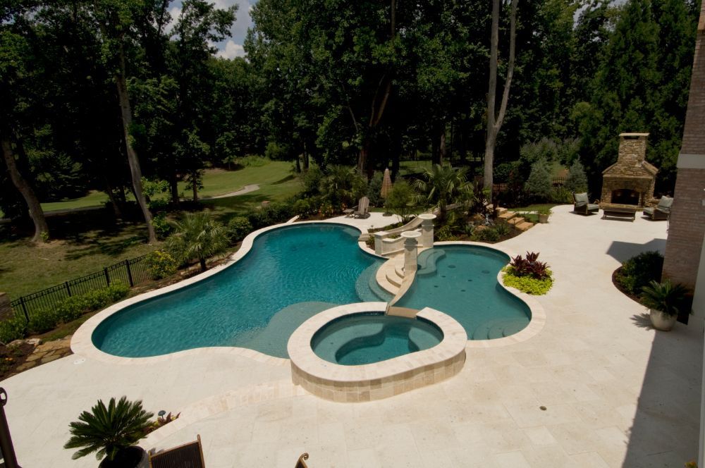 Inground Swimming pool, kiddie pool and spa with travertine