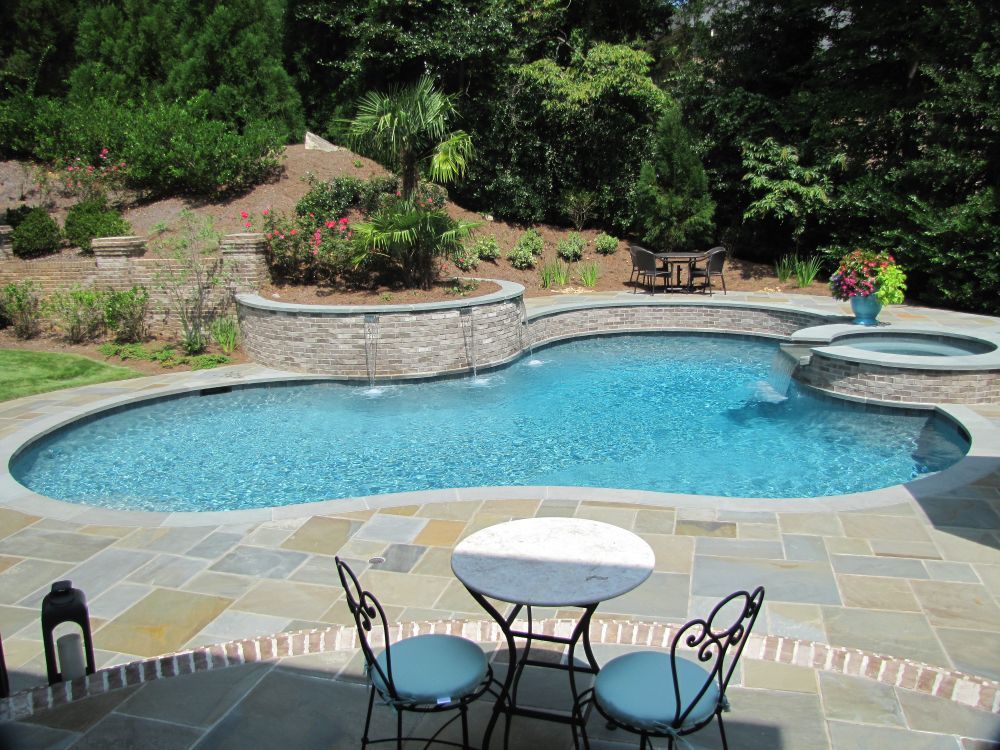 Inground swimming pool and spa with bluestone