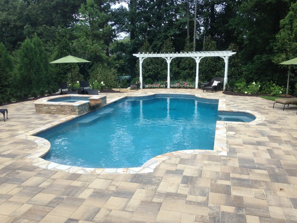Inground swimming pool with Laffit Rustic Slab Pavers avondale