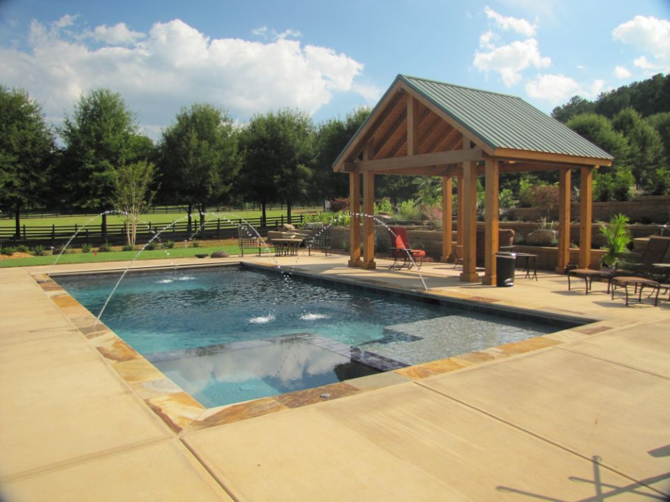 Inground swimming pool with pavilion