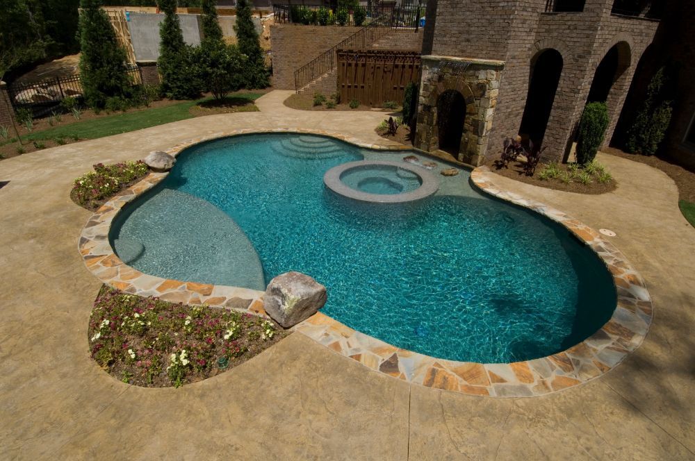 Inground swimming pool with sunken spa