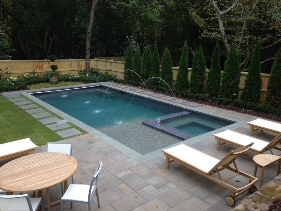 Pool with flush spa and deck jets