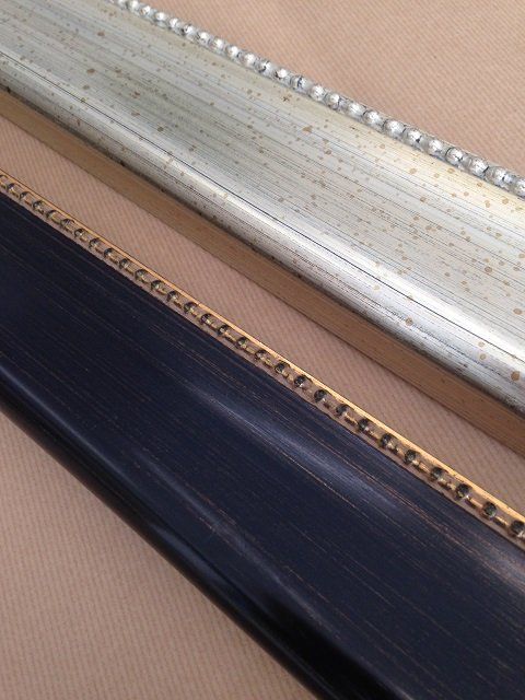 cornice asta intagliata nero argento