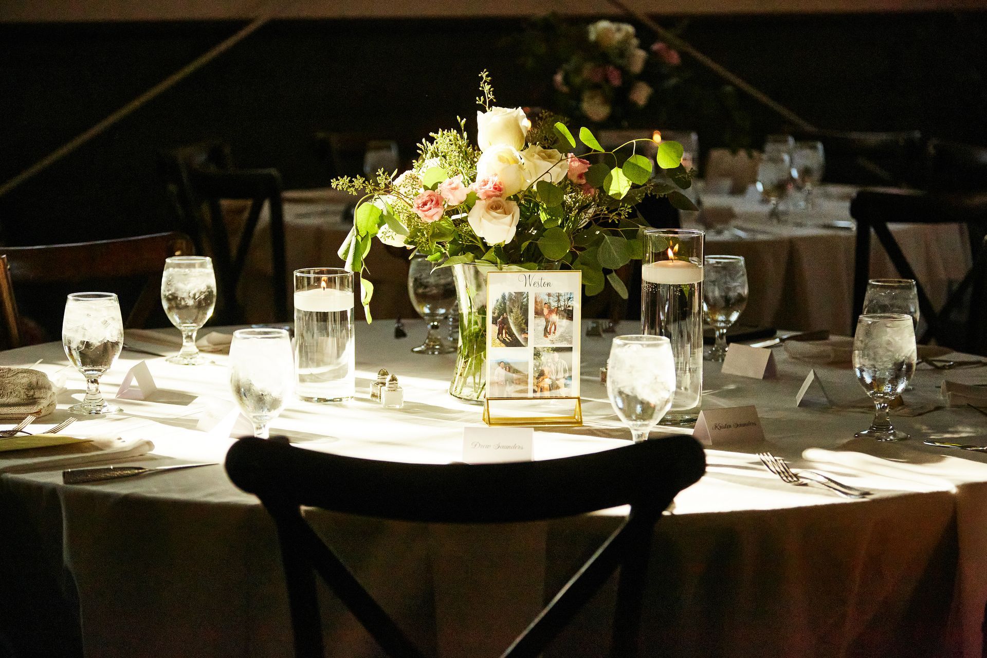 A table with a vase of flowers on it