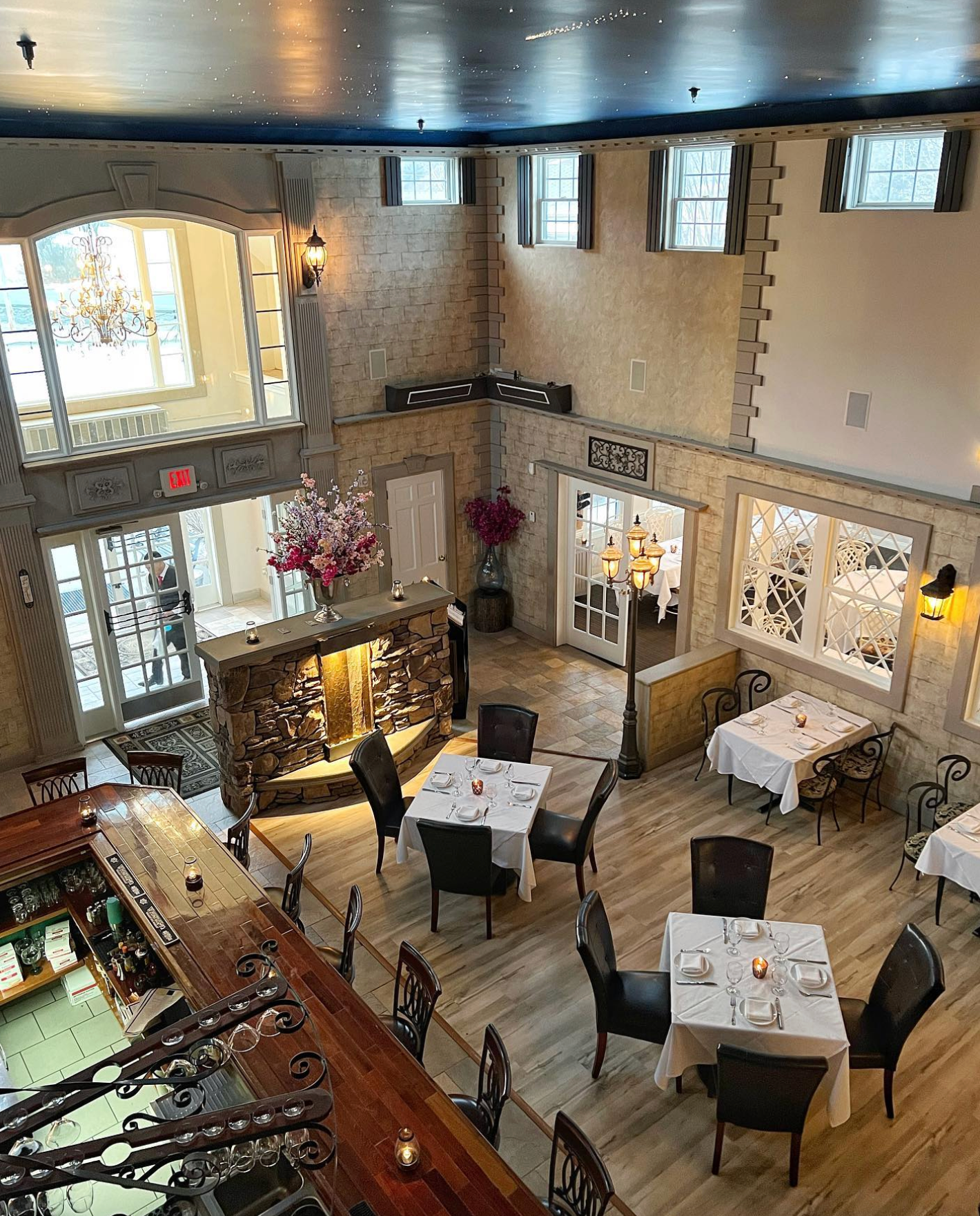 An aerial view of a restaurant with tables and chairs.