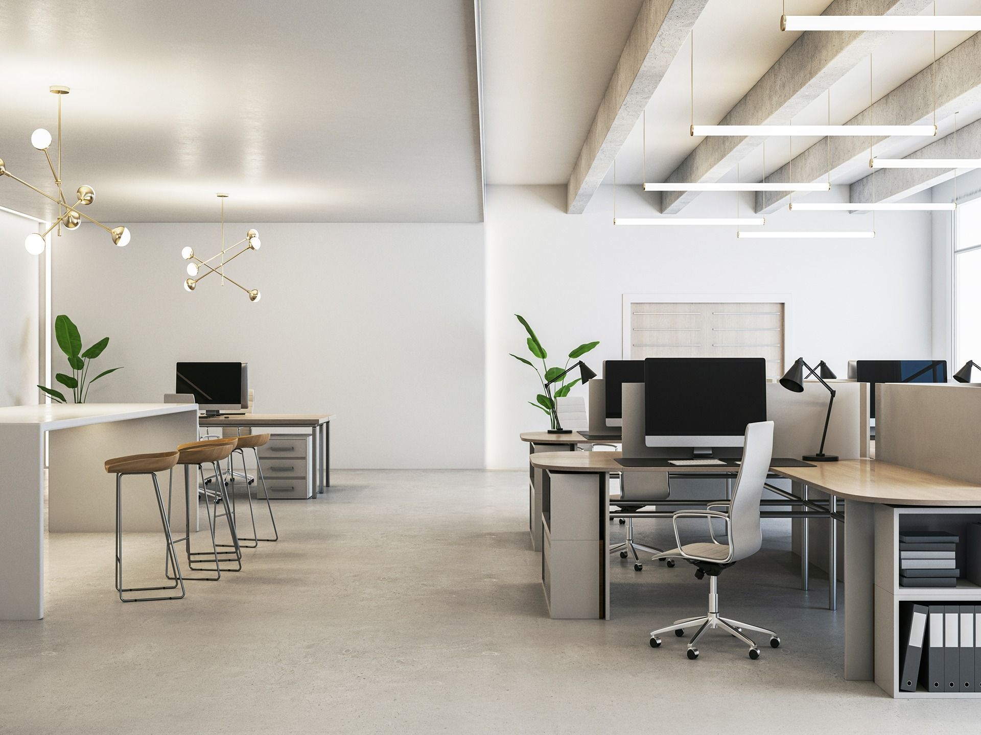 Modern open office with white desks, monitors, rolling chairs, and minimal decor