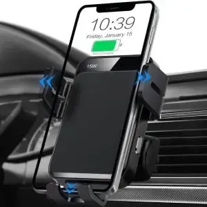 A cell phone is sitting in a car air vent holder.