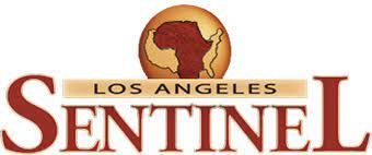 Logo for Los Angeles Sentinel: A brown/red graphic with the name and a globe with Africa inside.