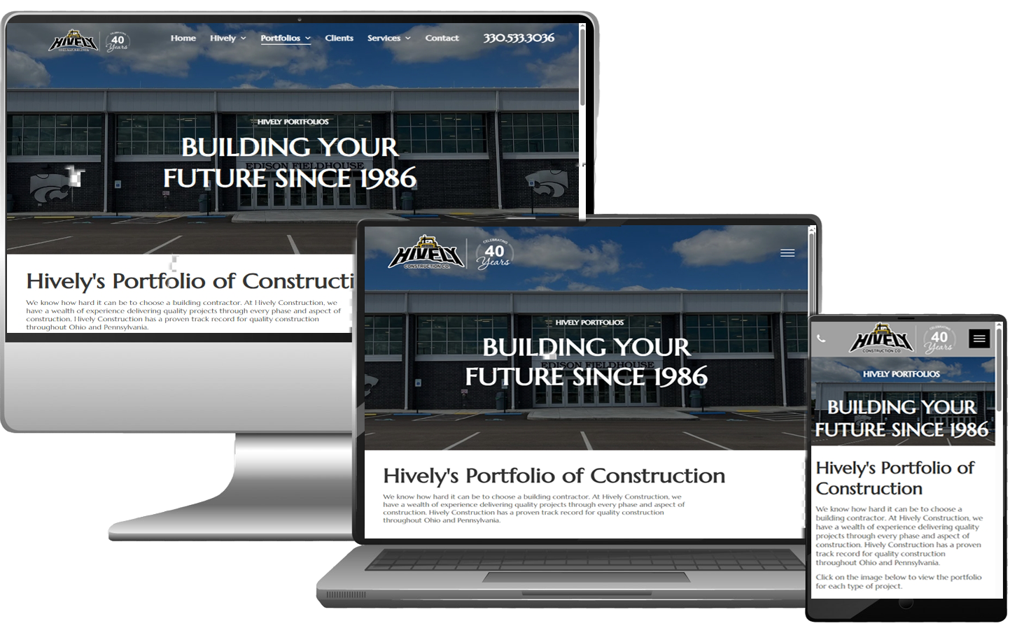 Website design showcasing a construction company's portfolio, displayed on a monitor, laptop, and phone.