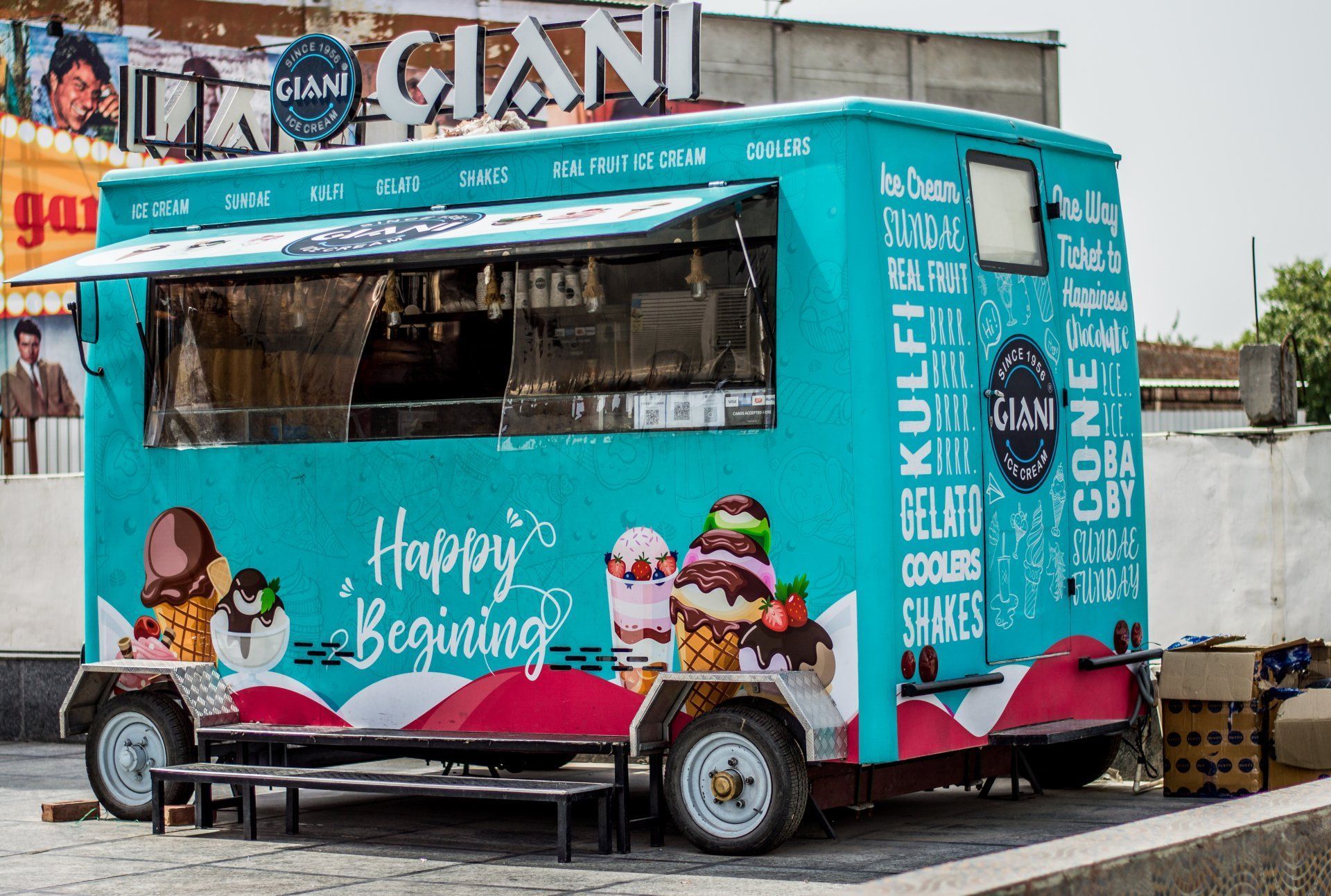 Turquoise ice cream food truck with 