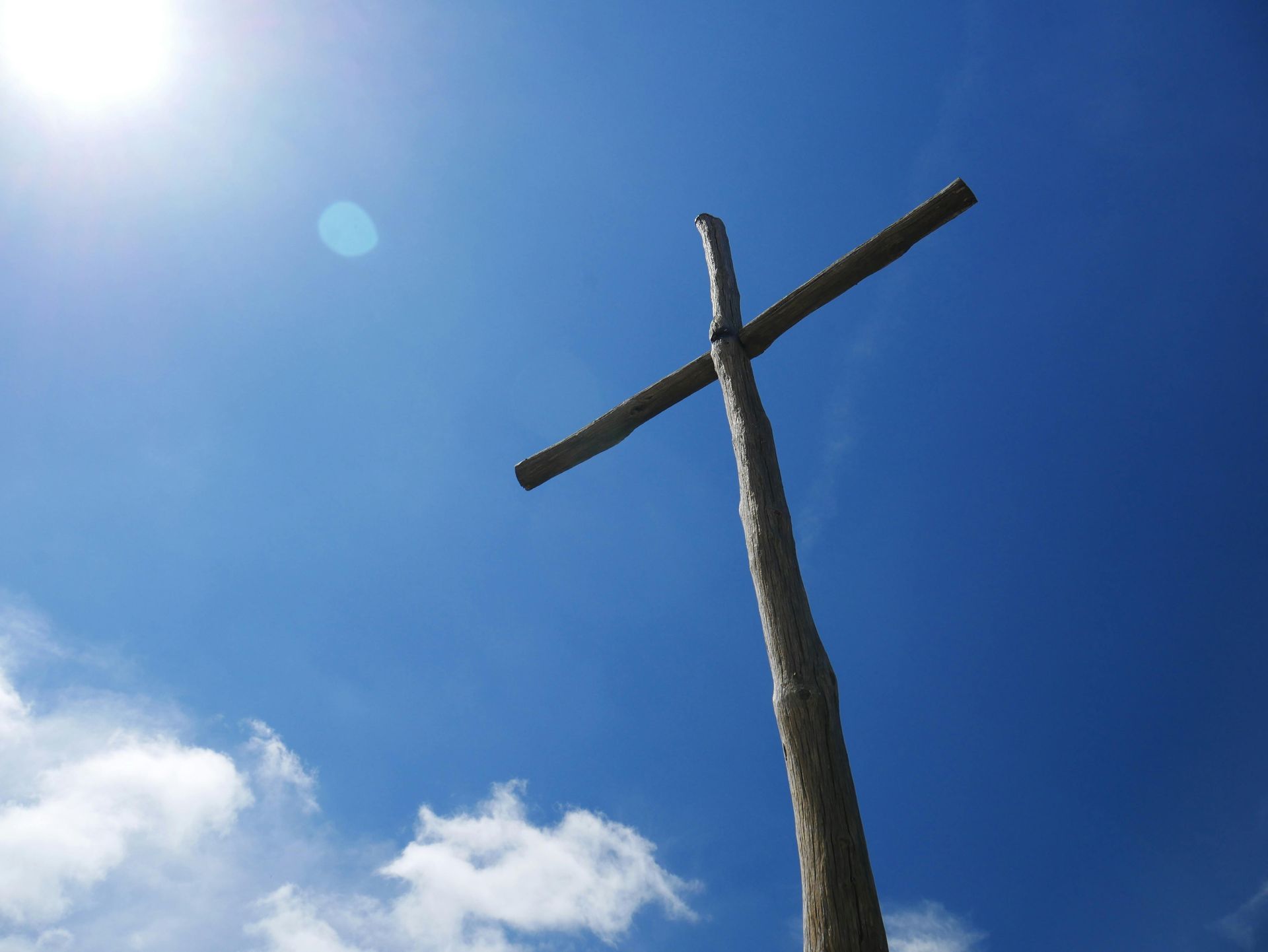 a cross against a blue sky