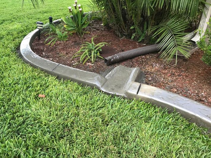concrete curb in residential garden