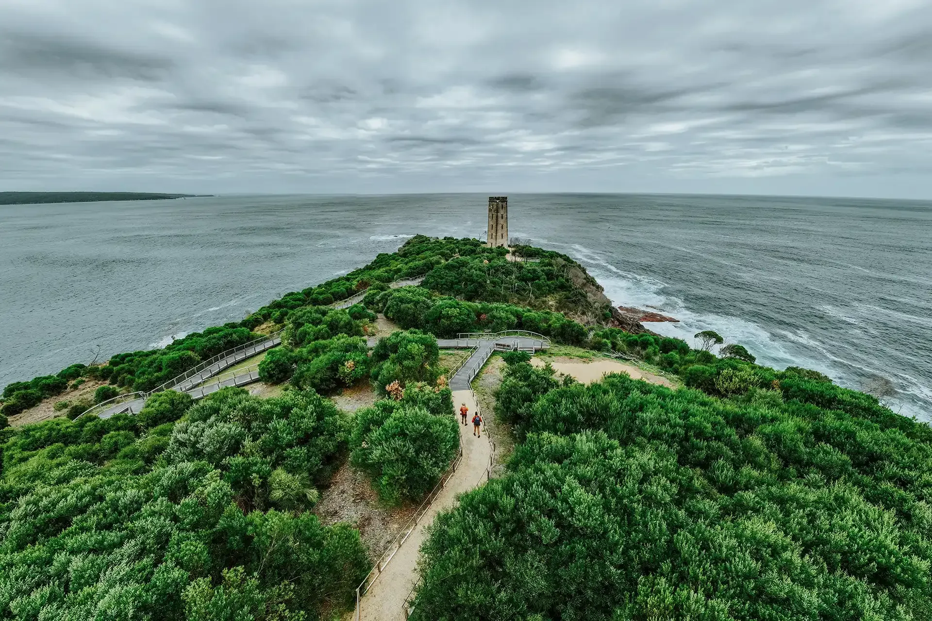 Hiking past Boyds Tower on the Light to Light walk