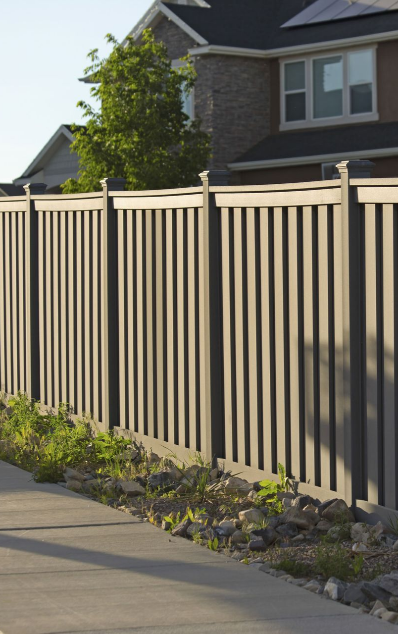 Residential fence during sunset highlighting installation by a fence installation contractor.
