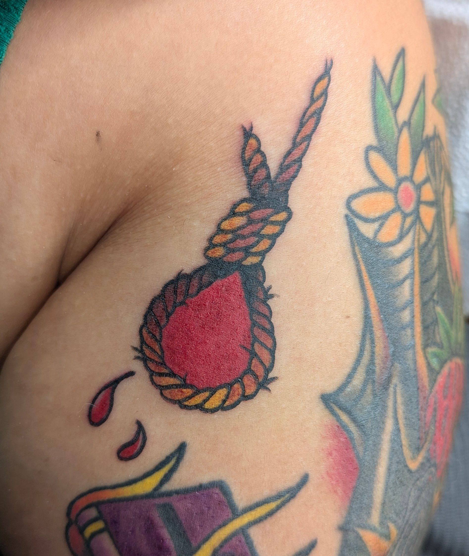 A close up of a tattoo on a person 's arm