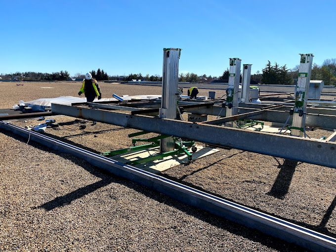 Workers Assembling Metal Erection