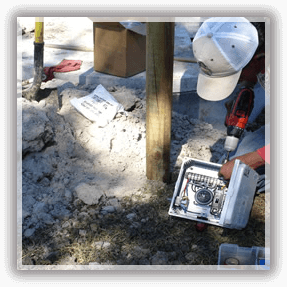 Septic Contractors — A Man Installing a Septic System in Alvin, TX