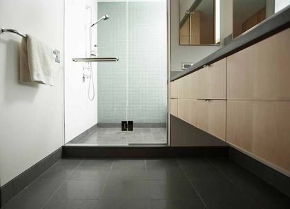 modern tile bathroom with glass shower door