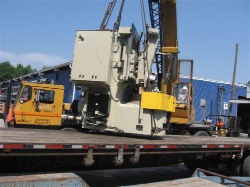 Crane Loading A Machine - Dallas, NC - McMillan Crane Services Inc.