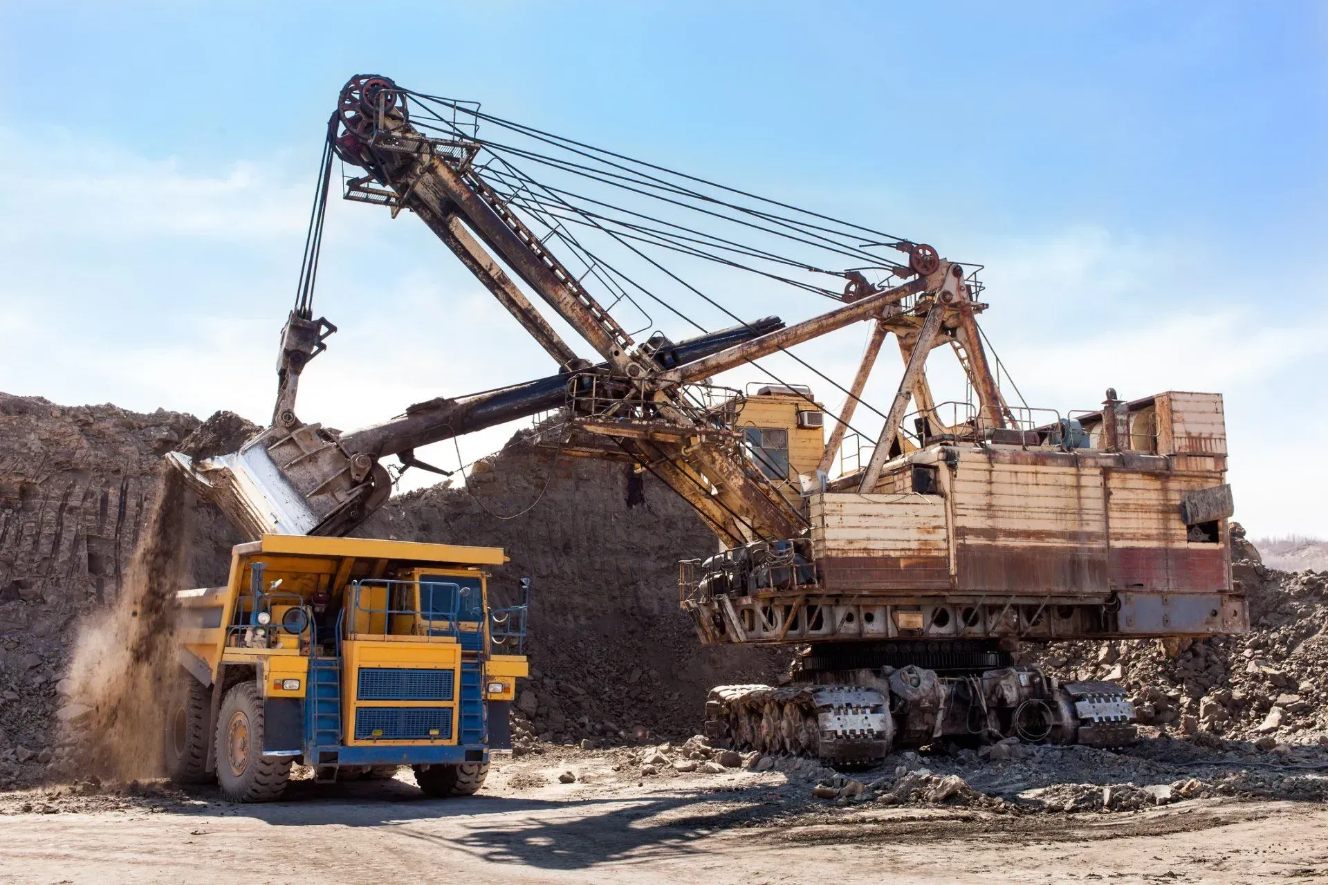 Mining excavator loading truck
