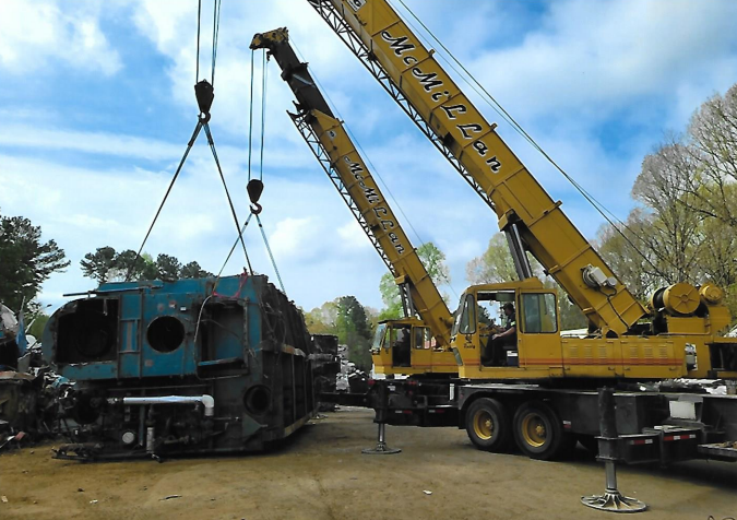 Crane Lifting A Tank - Dallas, NC - McMillan Crane Services Inc.