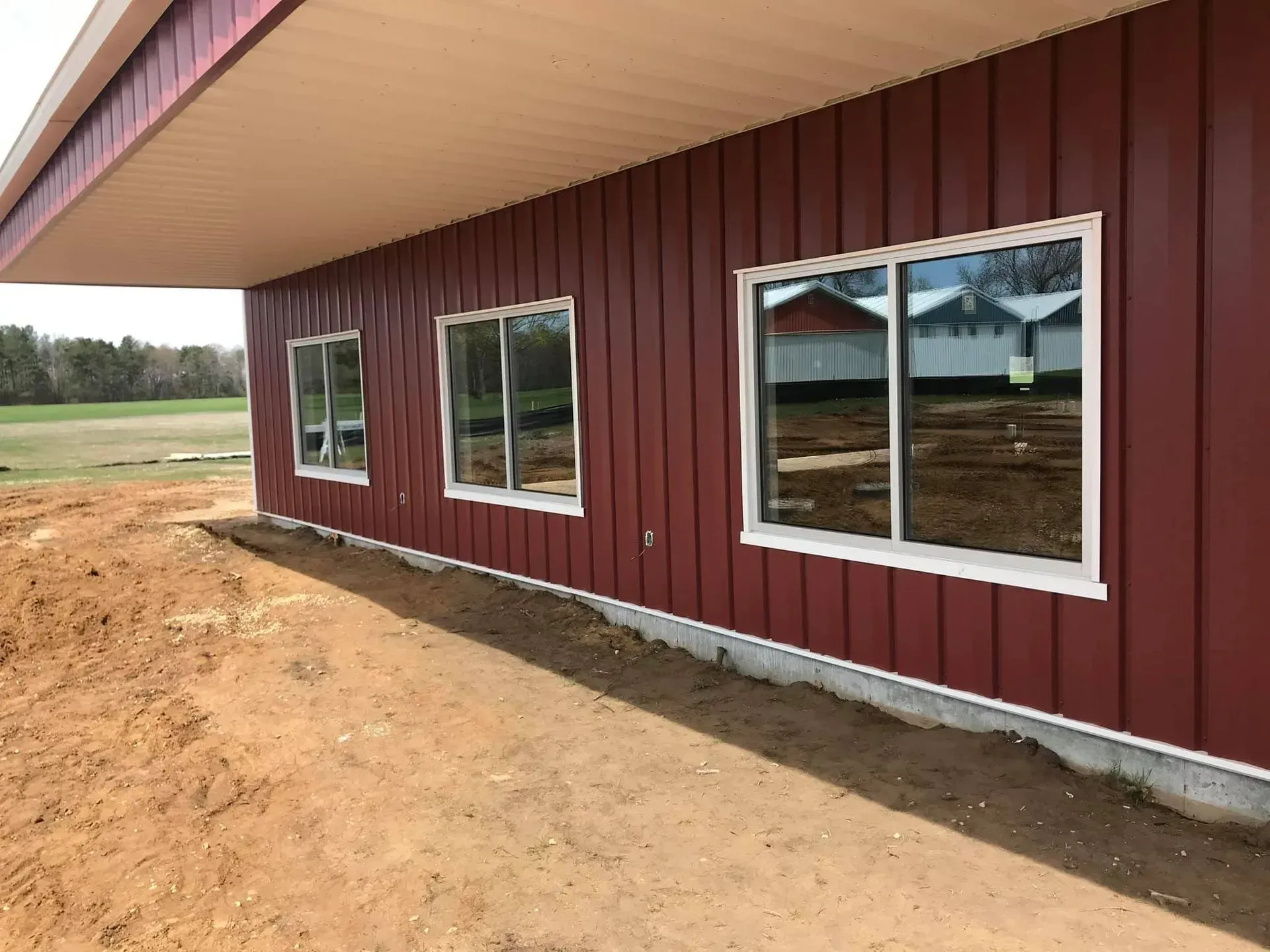 A red building with a lot of windows on it