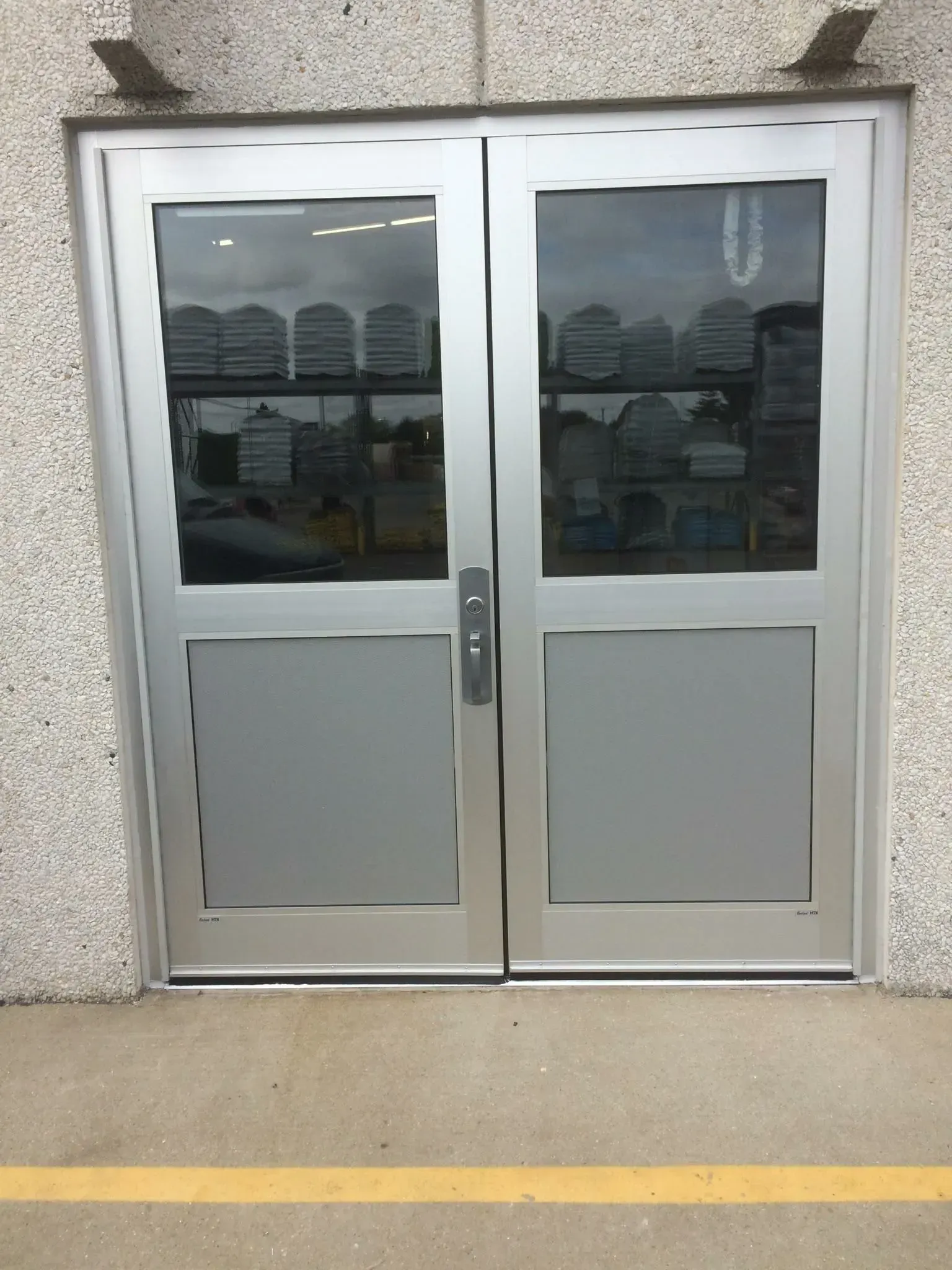 A pair of stainless steel doors on a building