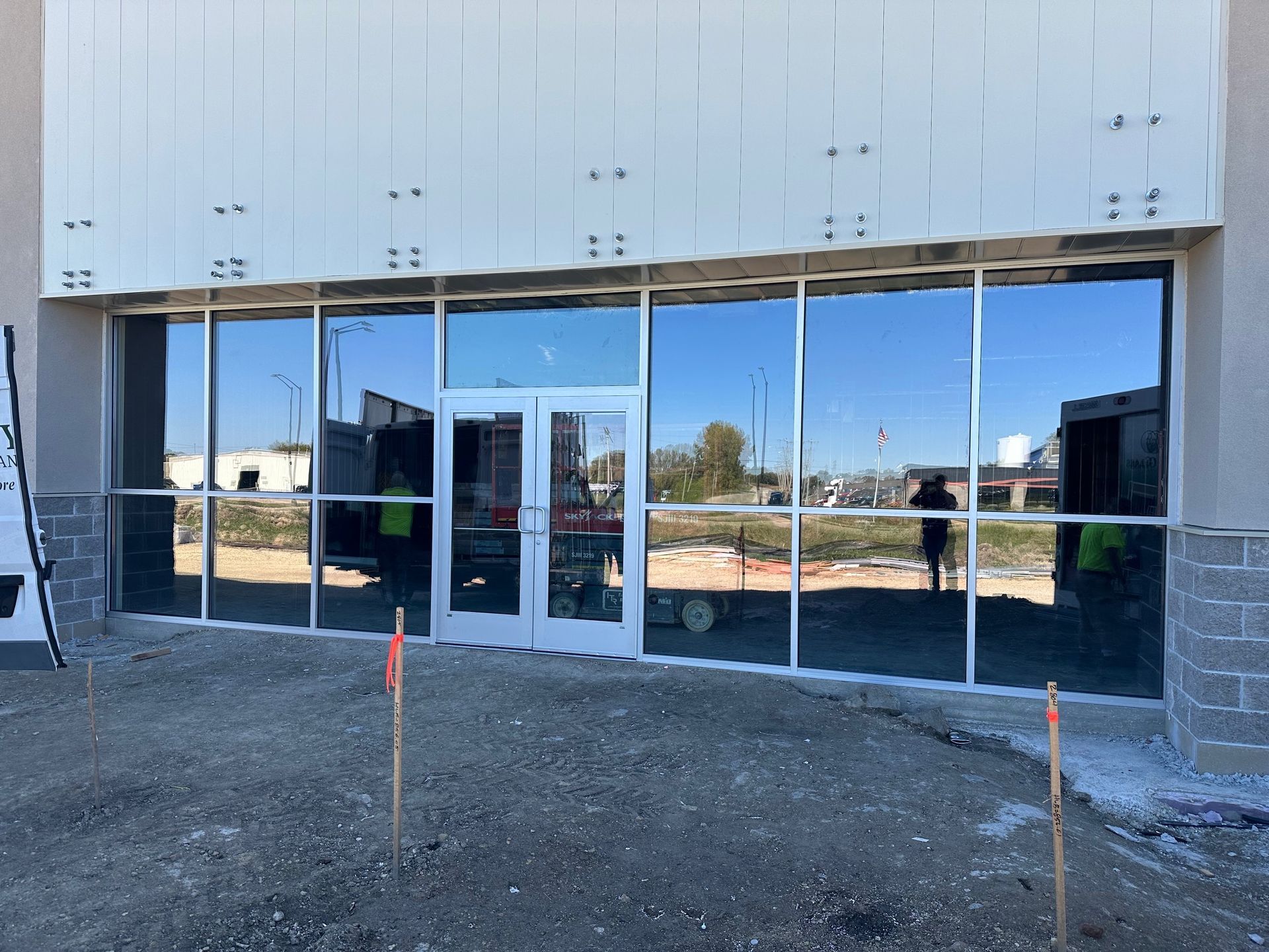 A large building with a lot of windows is being built.