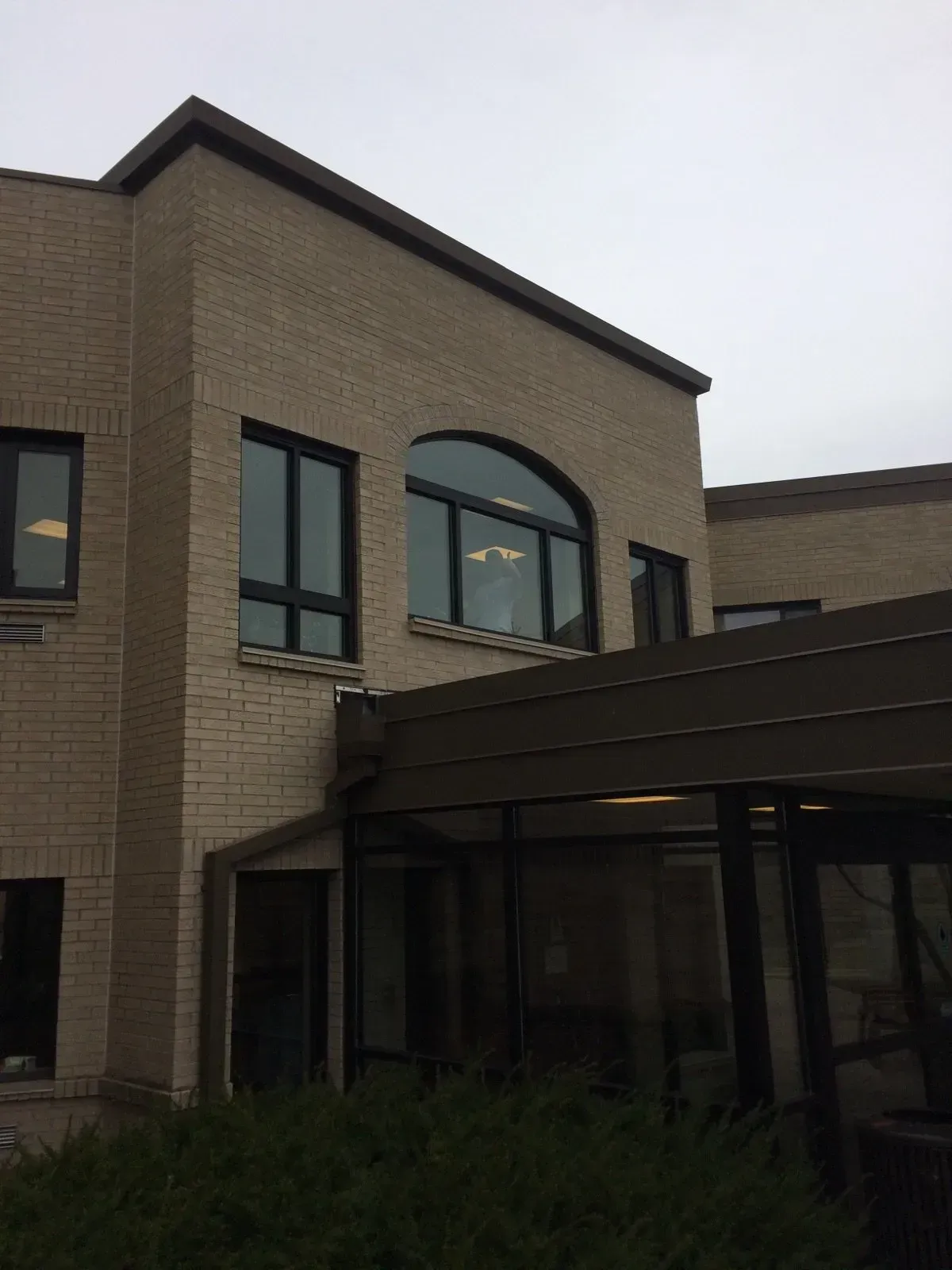 A large brick building with a lot of windows