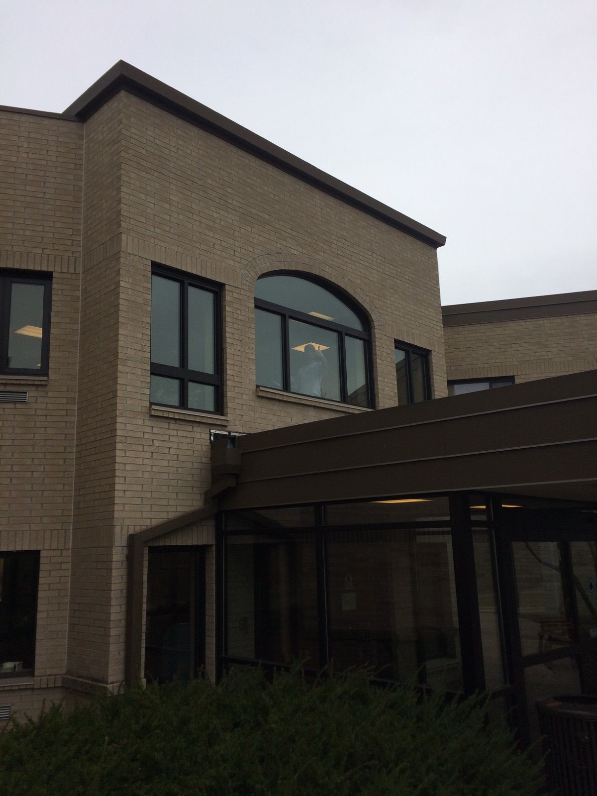 A large brick building with a lot of windows