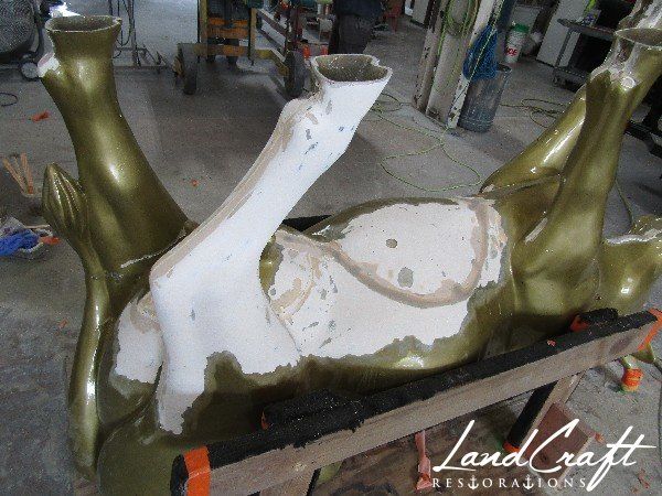 Top Cow art piece statue fiberglass structural repairs in process