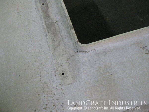 Damaged fiberglass panel from a VOR antenna shelter