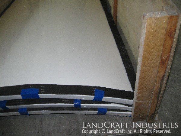 Repaired and refinished fiberglass VOR antenna shelter panels crated for shipment