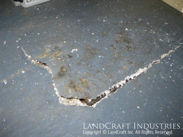 Fiberglass damage on boom lift bucket