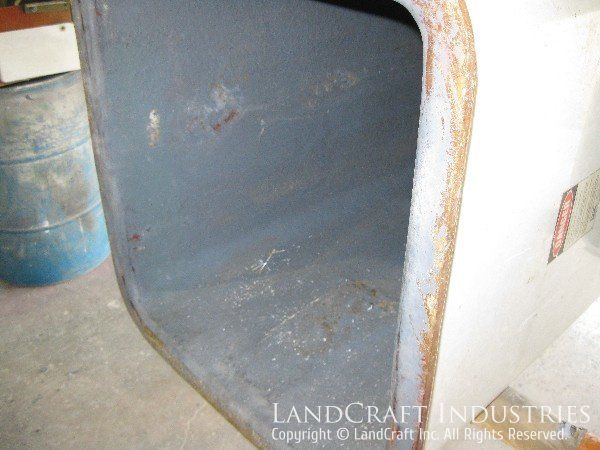Fiberglass damage on boom lift bucket