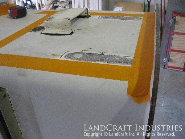Repairing fiberglass damage on a boom lift bucket