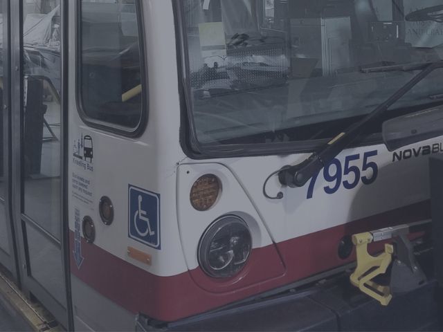 CTA commercial bus with fiberglass damage