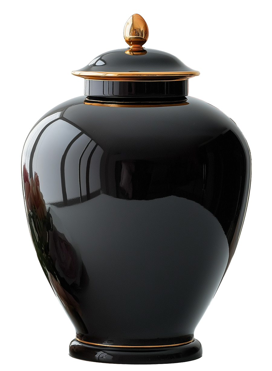 Black ceramic ginger jar with a gold-colored lid and rim.