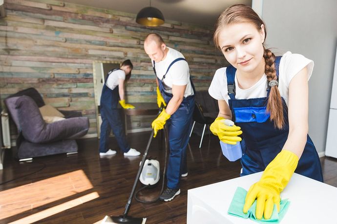 cleaners cleaning the house