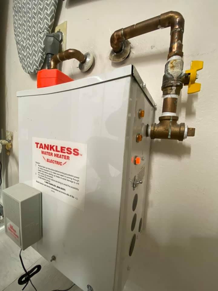 This is a 2001 tankless brand water heater found in a condo on the key