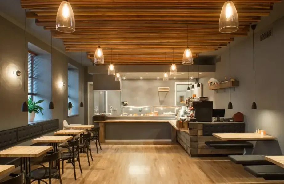 A Restaurant with Tables and Chairs and A Counter — Peter Gow Electrical in Lismore, NSW