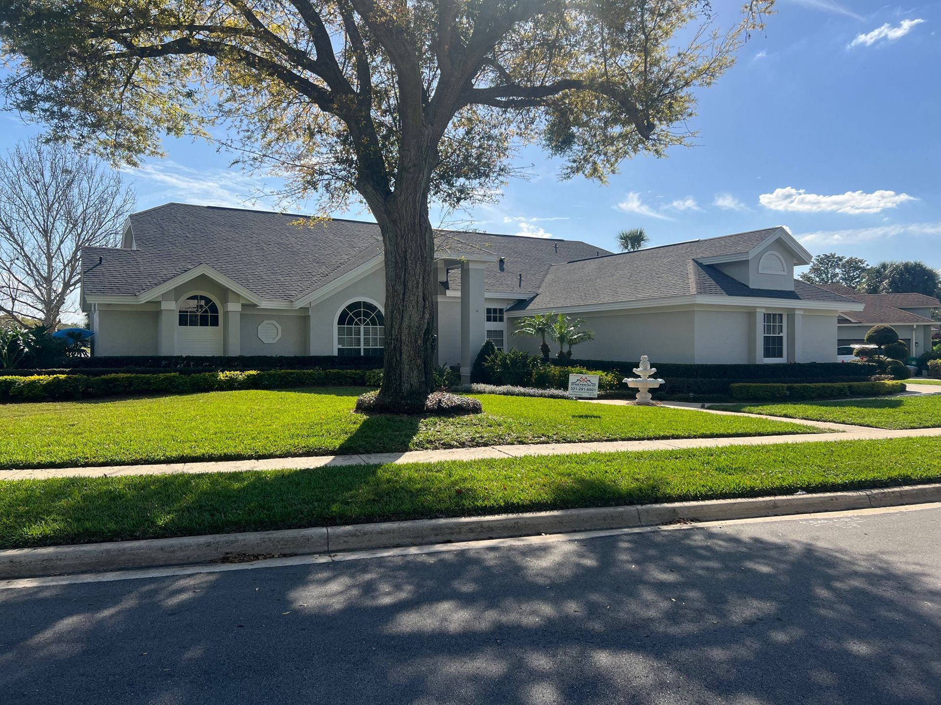 Large Home Featuring Shingle Roofing in Palm Bay, FL