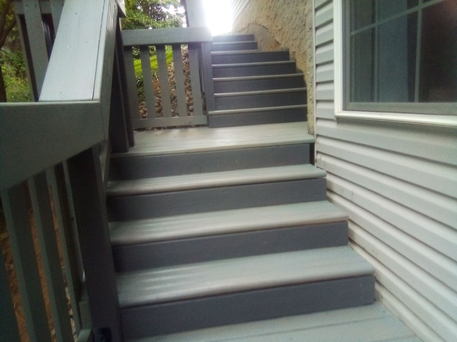 A set of stairs leading up to a house