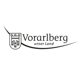 Logo von Vorarlberg, Österreich, mit einem stilisierten Wappen und dem Text „Vorarlberg unser Land“.