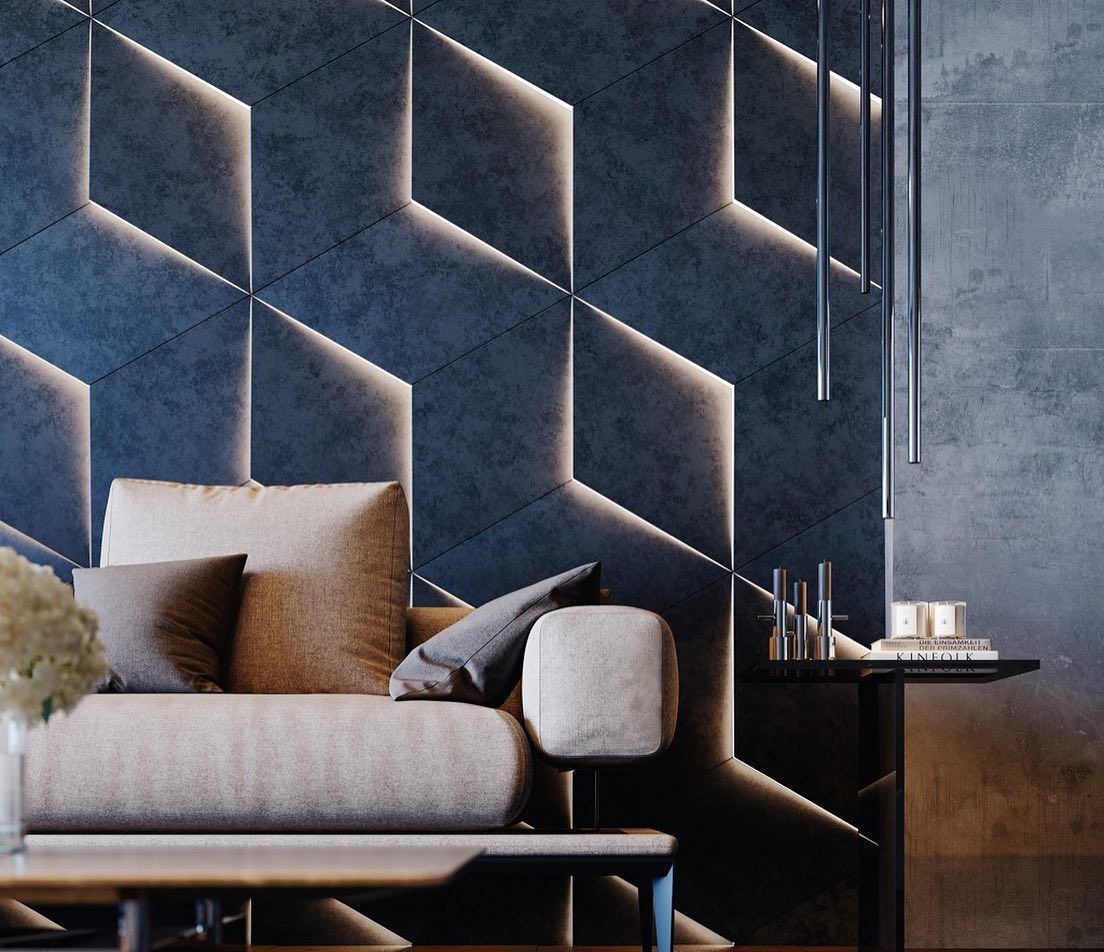 Uma sala de estar com sofá e parede geométrica