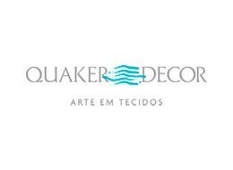 O logotipo da decoração quaker está em um fundo branco.
