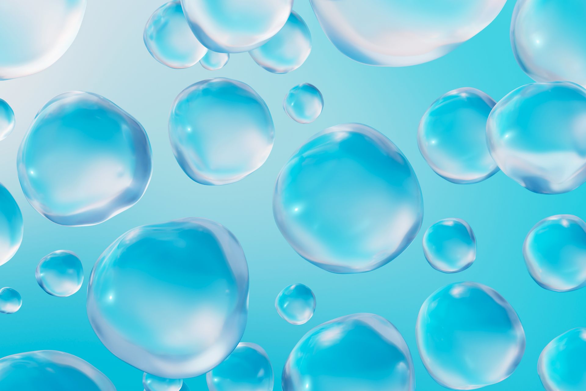 A bunch of water bubbles are floating in the air on a blue background.