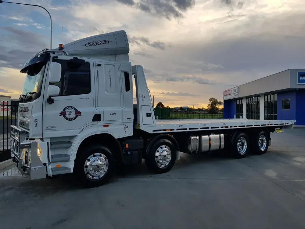 A White Flatbed Truck Parked in a Lot — Tamworth Tilt Trays in Tamworth, NSW